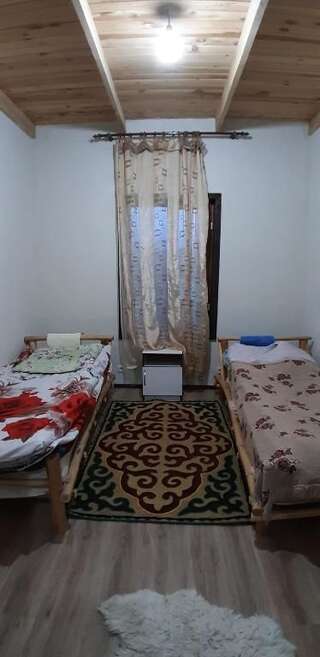 Гостевой дом Guest House Guljan Bokonbayevo Двухместный номер с 2 отдельными кроватями-5